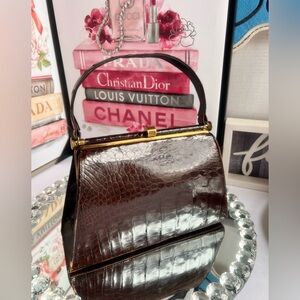 vintage 50s brown alligator frame handbag, a collectible 59